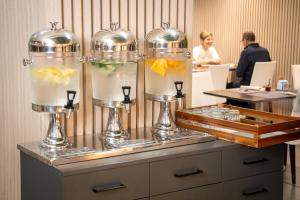 a buffet with two milkshakes on top of a table at Turia Granada in Granada +93 photos