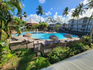 an image of a swimming pool at a resort at Marina View in Les Trois-Îlets