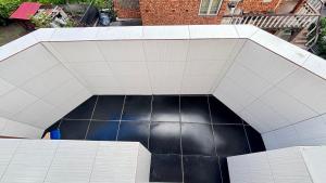 an overhead view of a black and white tunnel at Apartament Ultra-Central Rm Valcea in Râmnicu Vâlcea