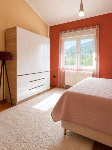 a bedroom with a bed and a dresser and a window at Villa Besha in Herceg-Novi +43 photos