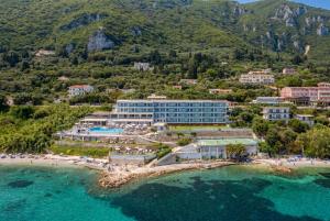 an aerial view of a resort on a beach at Alyssium in Benitses