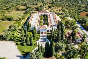 an aerial view of a mansion with trees at Octant Vila Monte in Moncarapacho