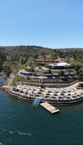 an aerial view of a resort on the water at Bujtina Sarda in Rragam
