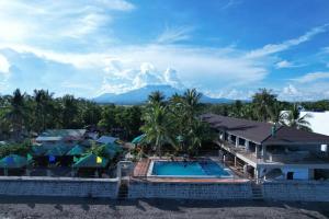 an aerial view of a resort with a swimming pool at Balai-Cintai Beach Resort in Castañas
