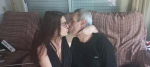 a man and a woman sitting on a couch at Jose María in El Vendrell +3 photos