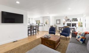 a living room with a couch and a table at Dana Point Lantern District Retreat Beach Close in Dana Point