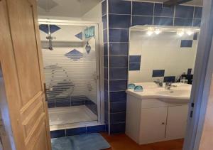 a bathroom with a shower and a sink at Bastide Du Maoupas Gîtes in Belgentier +86 photos