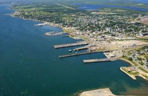 an aerial view of a harbor with boats in the water at spacious three bedroom apartment in Bras D'or