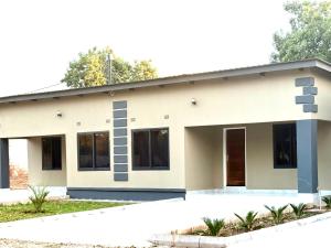 a rendering of a small house at Black-Oak Apartments in Lusaka