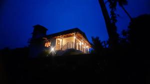 a house at night with its lights on at Anchor House in Ahangama +42 photos