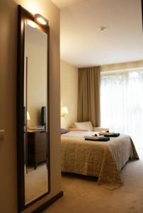 Ένα ή περισσότερα κρεβάτια σε δωμάτιο στο Guest House Aštuoni