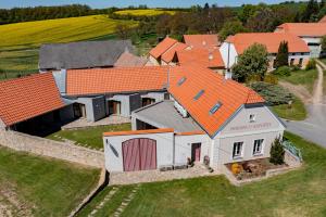 an aerial view of a house with an orange roof at Penzion U Kapličky in Znojmo