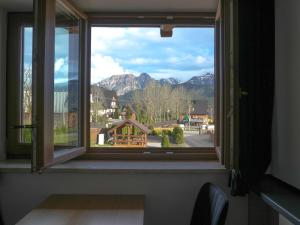 a window with a view of a mountain view at Willa Chrycówka - Jacuzzi, Basen, Sauna in Kościelisko