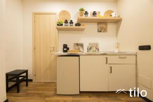 a kitchen with a sink and a counter top at City center 4’|Studio|wifi|By tilo in Genoa