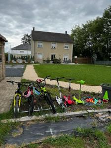 a group of bikes parked in front of a house at Zen House - Shopping at 3 min in Marnach
