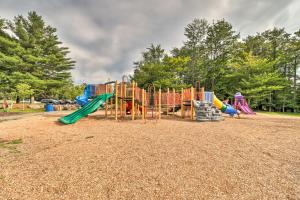 a playground with a slide and a play structure at Lake Access & Game Room! Poconos Resort Getaway in Tobyhanna