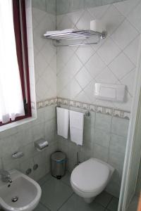 Ванная комната в Pensione Al Pescatore