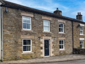 an old brick house with white windows at 4 Bed in Bishop Auckland oc-93527 in Wear Head