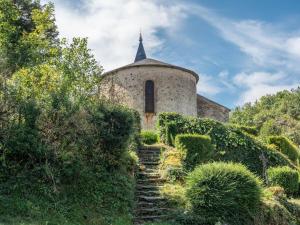 an old building with a staircase leading up to it at Presbytère st michel de léon in Lacaze +21 photos