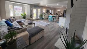 a living room with a couch and a table at H20 paradise in Texas City