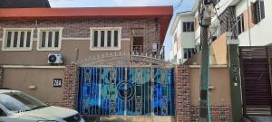 a building with a gate in front of it at Kembod hotel & suite in Ikeja