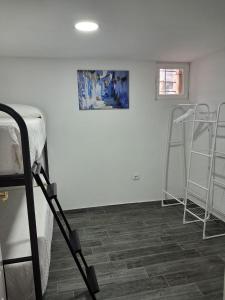 a room with two bunk beds and two ladder at Casa YaraMaya in Carballino