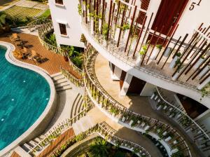 an overhead view of a building with a pool at Happy Life Memories Hoi An Hotel & Spa in Hoi An