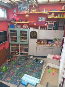a childs play room with toys on the floor at Ferienwohnung Familie Rudolf in Coswig