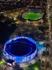 an overhead view of a soccer stadium at night at Casa cerca al Campín in Bogotá