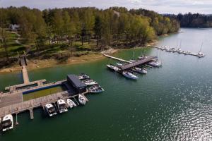 an aerial view of a marina with boats in the water at Selene Houseboat Polańczyk in Polańczyk