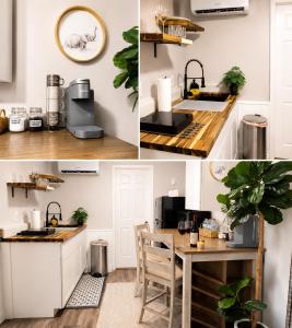 a kitchen with white cabinets and a sink and a table at Tropical Casita LaVida in Tampa