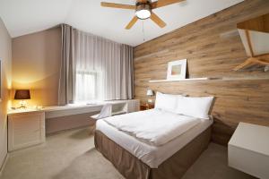 Posteľ alebo postele v izbe v ubytovaní Cihelny Golf & Wellness Resort