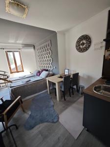 a living room with a couch and a table at Guesthouse Yildiz in Sarajevo