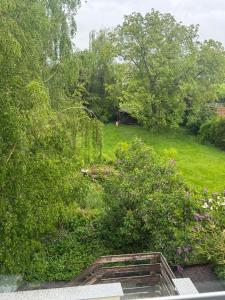 a garden view from the roof of a house at Ruhiges und gemütliches Appartment mit Garten in Herford +4 photos