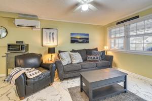 a living room with a couch and a chair at Steps to Beach! North Myrtle Beach (Cherry Grove) in Myrtle Beach