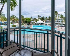 a view of the pool from the balcony of a resort at Tween Waters Island Resort & Spa in Captiva
