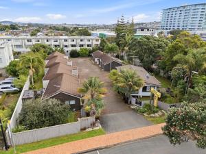 an aerial view of a residential neighbourhood with houses at Orewa Motor Lodge in Orewa