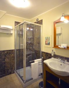 a bathroom with a shower and a sink at B&B La Casa dei Tintori in Florence