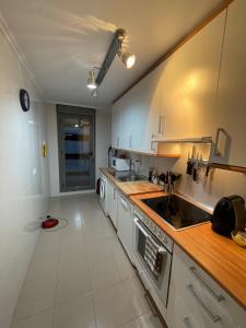 a kitchen with a sink and a counter top at Apartamento Robledal de Cirueña in Cirueña