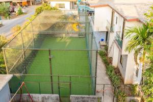 an overhead view of a tennis court on a street at Royal Heritage Lonavla - 7BHK with Turf in Lonavala