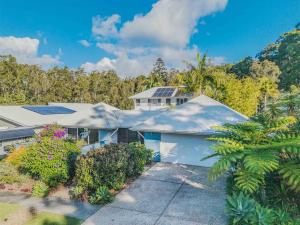 an aerial view of a house with trees and bushes at Macadamia Ocean Escape in Pottsville