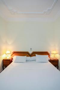 Ένα ή περισσότερα κρεβάτια σε δωμάτιο στο Riad Asma