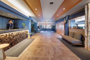 a lobby of a hotel with a bar at Club Wyndham Shirakabaso Shigakogen in Yamanouchi +132 photos