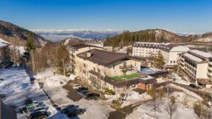 an aerial view of a building in the snow at Club Wyndham Shirakabaso Shigakogen in Yamanouchi