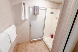 a shower stall in a bathroom with a shower at So Davis St 333 Unit #414 ~ Mountaineer in Telluride +11 photos