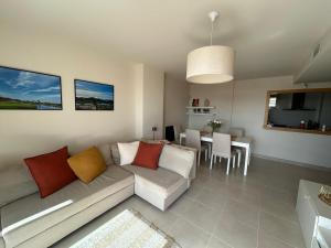 a living room with a couch and a table at Apartamento cómodo, terraza - 4 pers. - ES-376-48 in Pulpí