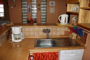 Kuchyňa alebo kuchynka v ubytovaní Apartmán Hořice na Šumavě