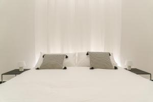 A bed or beds in a room at B&B 4 ELEMENTI CATANIA