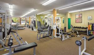 a gym with several treadmills and weights at Flagstaff Resort 2BR Apartment in Flagstaff