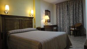 Кровать или кровати в номере PARAISO PLAYA Hotel